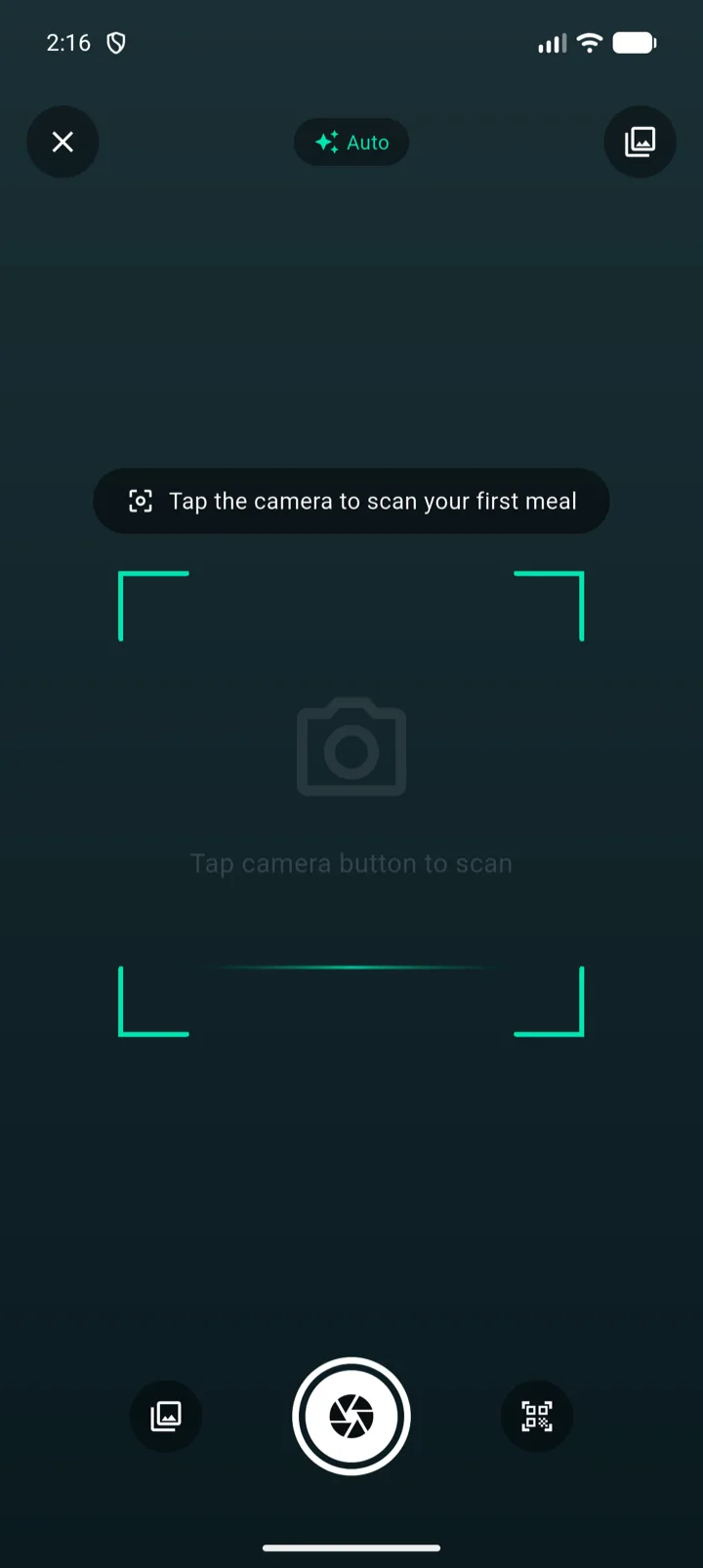PlateIQ camera food scanner with a focus frame and prompt to tap the shutter to scan your first meal.